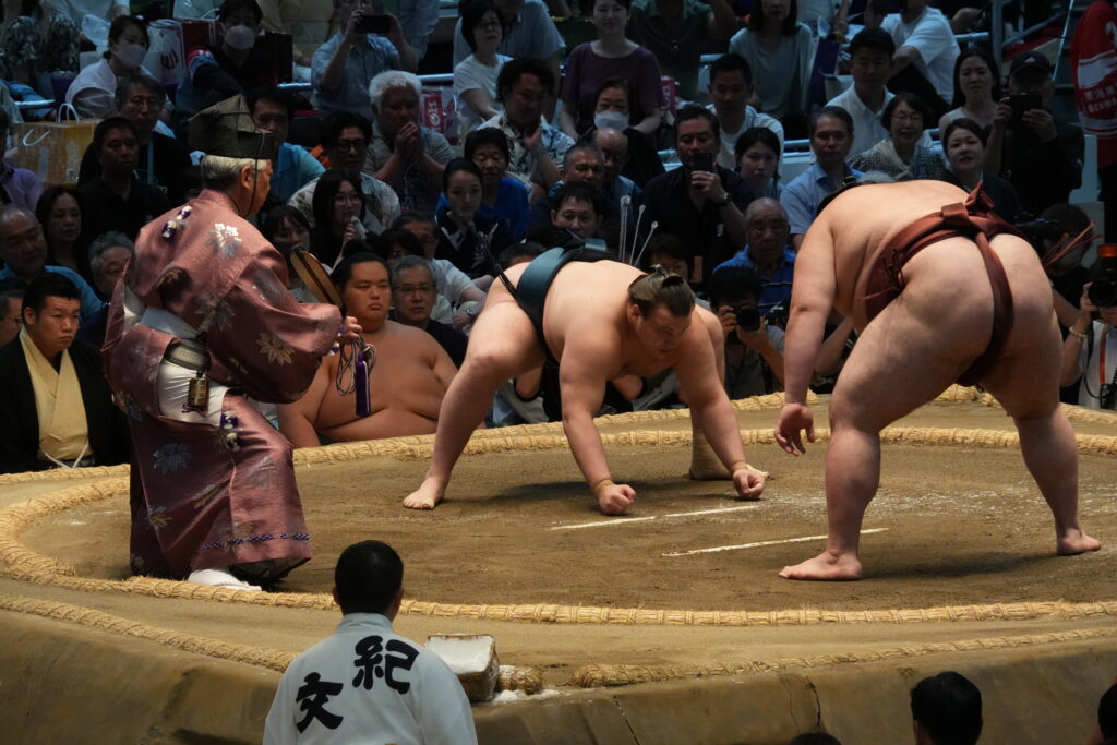Aonishiki and Atamifuji preparing to fight at the 2026 Nagoya Basho sumo tournament.